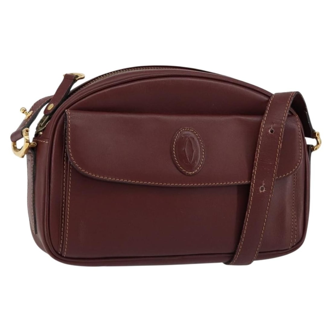 CARTIER Must Line Bordeaux Leather Shoulder Bag Gold Accents: CARTIER Must Line Bordeaux Leather Shoulder Bag Gold Accents This authentic CARTIER Must Line Shoulder Bag is crafted from high-quality leather in a rich Bordeaux and gold color combination. With dime