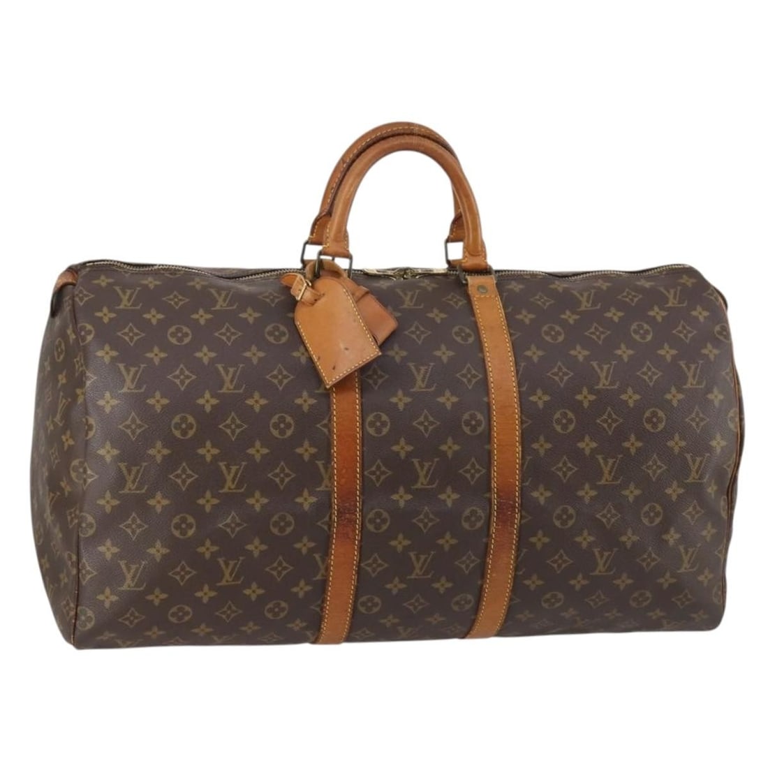 Louis Vuitton M41424 Keepall 55 Monogram Canvas Boston Bag: Louis Vuitton M41424 Keepall 55 Monogram Canvas Boston Bag Louis Vuitton Keepall 55 Boston bag in Monogram canvas, made in France. This travel bag includes a name tag and Powanie. Condition is heavily