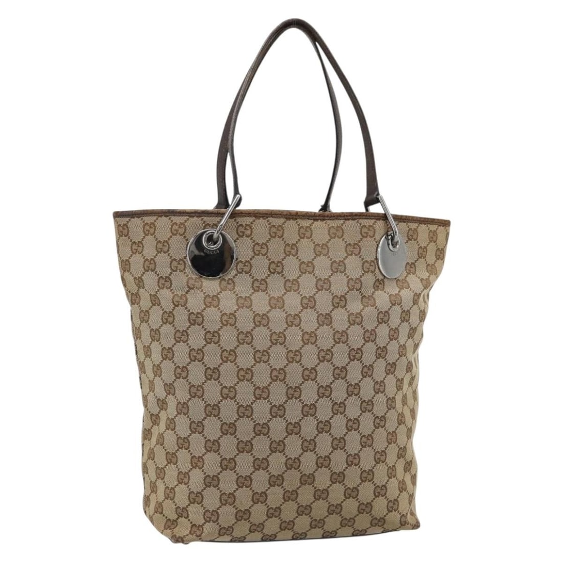 Gucci 120836 GG Canvas Tote Handbag Beige Silver Tone: Gucci 120836 GG Canvas Tote Handbag Beige Silver Tone GUCCI GG Canvas Tote Bag in beige and silver, made in Italy from GG canvas. This tote bag features a handle drop of approximately 19 cm (7.5 in) a