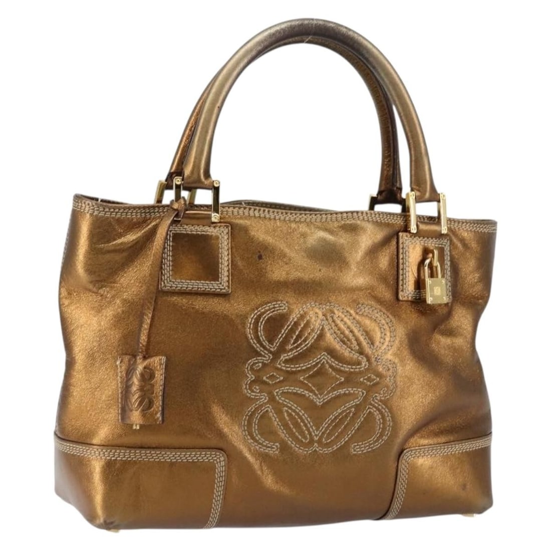 LOEWE Justa Anagram Leather Handbag Bronze Gold with Padlock Keys: LOEWE Justa Anagram Leather Handbag Bronze Gold with Padlock Keys A LOEWE Justa handbag in leather with a bronze and gold color scheme. It comes with a padlock, two keys, and a clochette. Made in Spai