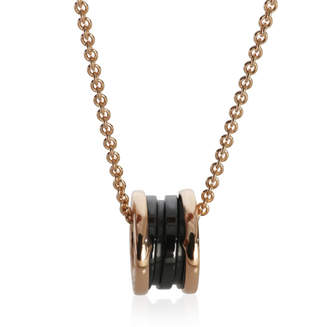 Bvlgari B.zero1 18k Rose Gold Ceramic Necklace with Box: Bvlgari B.zero1 18k Rose Gold Ceramic Necklace with Box This BVLGARI B.zero1 necklace features a sophisticated combination of 18k rose gold and ceramic, offering a modern and elegant design. The neckl