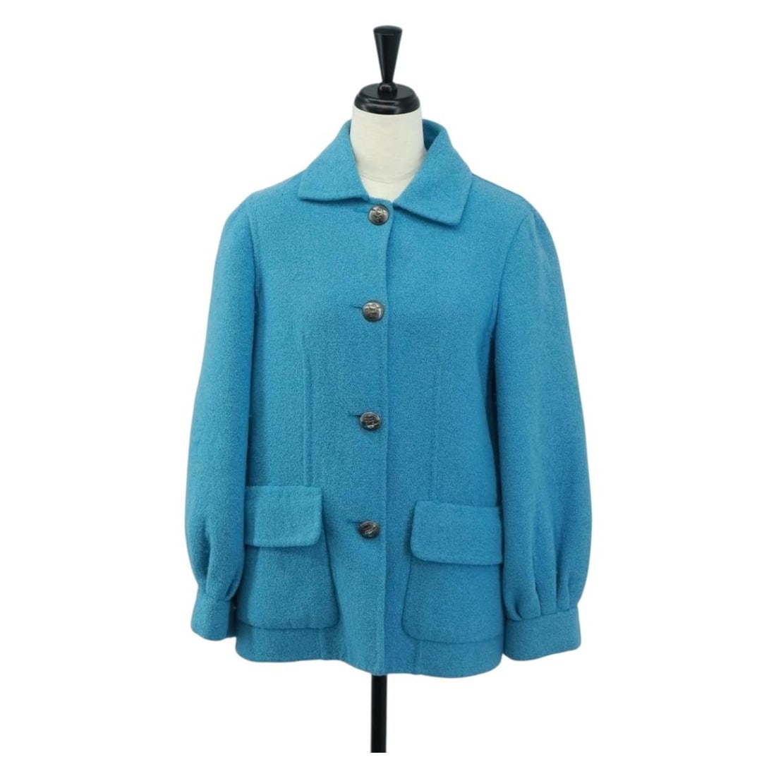 Light Blue Wool Jacket by Salvatore Ferragamo Italy: Light Blue Wool Jacket by Salvatore Ferragamo Italy This Salvatore Ferragamo jacket is crafted from light blue wool and features a classic design. Made in Italy, it offers a refined look with a should