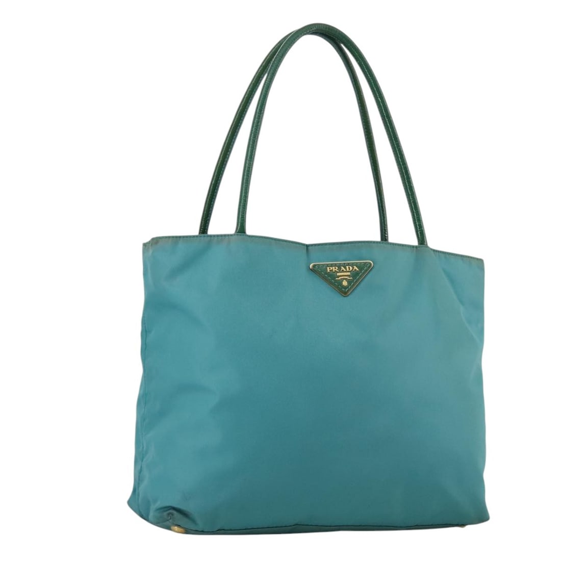 Prada Blue Gold Nylon Tote Bag Italy 12.2 Inch: Prada Blue Gold Nylon Tote Bag Italy 12.2 Inch This PRADA tote bag features a blue and gold nylon exterior, offering a stylish and functional accessory for everyday use. Designed for women, it is craf