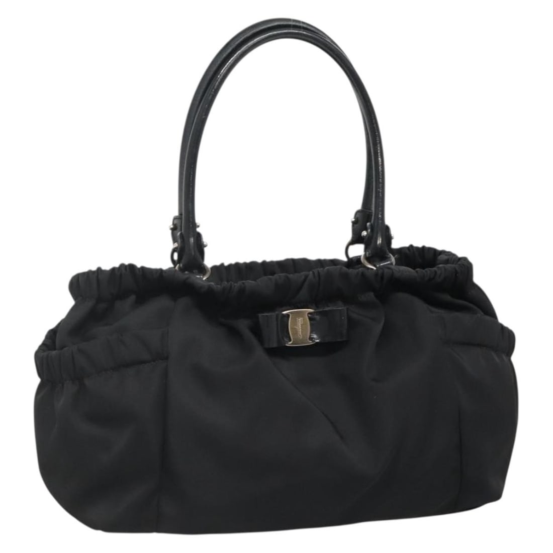 Salvatore Ferragamo Vala Nylon Black Silver Women Handbag Italy: Salvatore Ferragamo Vala Nylon Black Silver Women Handbag Italy This Salvatore Ferragamo Vala handbag is crafted from black nylon with silver-tone accents. Designed for women, it features a spacious i