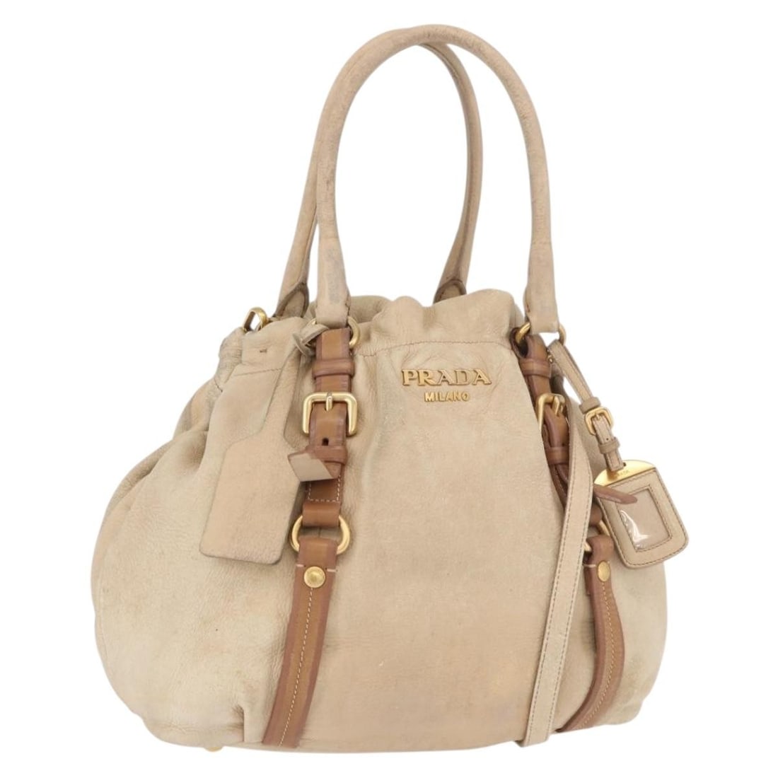 Prada 2way Leather Tote Bag Beige Gold with Strap Name Tag: Prada 2way Leather Tote Bag Beige Gold with Strap Name Tag PRADA tote bag in beige and gold leather with a 2-way design. It includes a name tag and shoulder strap, and was made in Italy. The bag shows