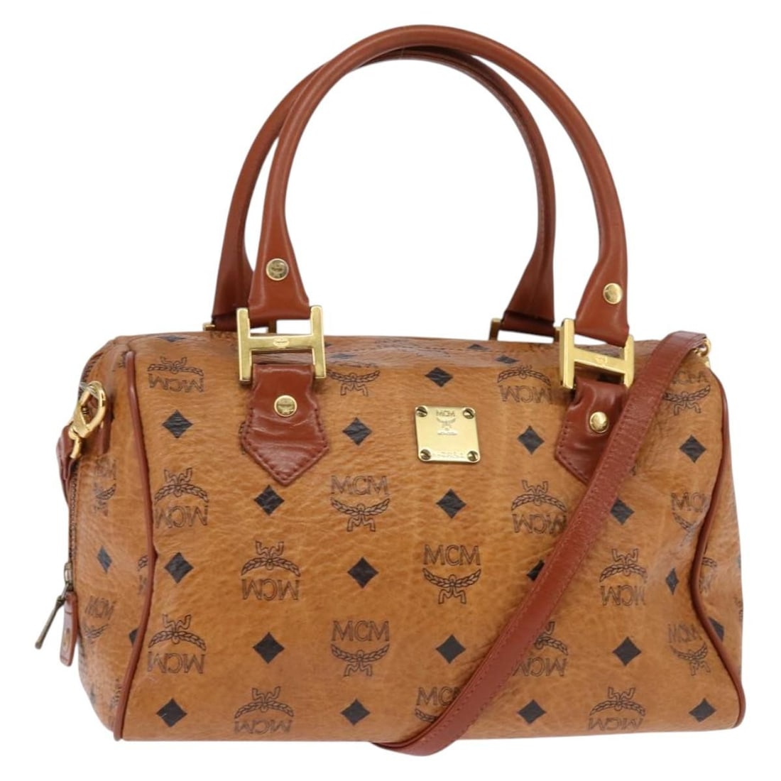 MCM Logogram Boston Bag PVC Leather Brown Gold 2way Auth: MCM Logogram Boston Bag PVC Leather Brown Gold 2way Auth Introducing the MCM Logogram Vicetos Boston Bag, a stylish and practical accessory for any fashion enthusiast. Crafted from durable PVC leather