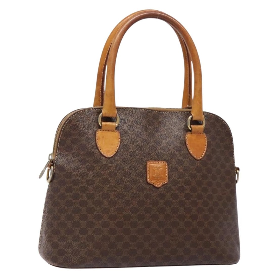 CELINE Macadam Hand Bag PVC Leather Brown Gold Made in Italy: CELINE Macadam Hand Bag PVC Leather Brown Gold Made in Italy This CELINE Macadam Canvas Hand Bag combines elegance with practicality. Crafted from durable PVC leather, this handbag features a stylish 
