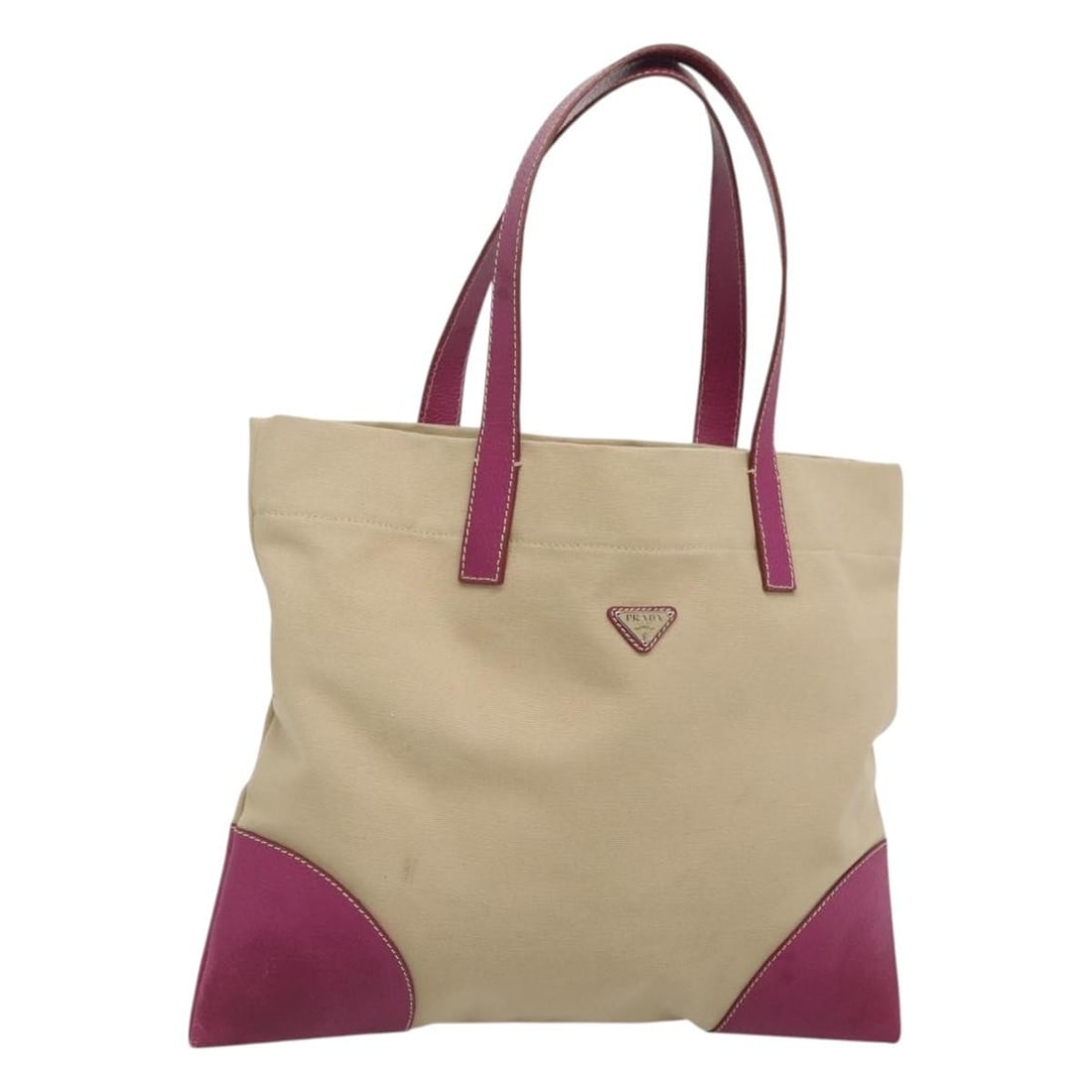Prada Beige and Silver Canvas Leather Women's Tote Handbag Italy: Prada Beige and Silver Canvas Leather Women's Tote Handbag Italy This PRADA tote bag features a beige and silver canvas exterior with leather accents. Designed for women, the bag is made in Italy and 