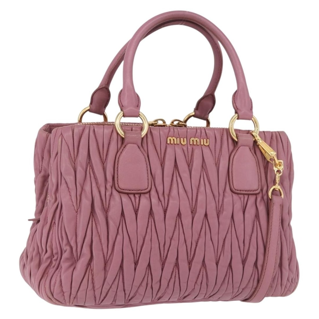 Miu Miu Matelasse Leather 2way Handbag Pink with Strap Card: Miu Miu Matelasse Leather 2way Handbag Pink with Strap Card This Miu Miu Matelasse hand bag is crafted in pink leather with gold-tone hardware and a 2-way design. It comes with a shoulder strap and gu