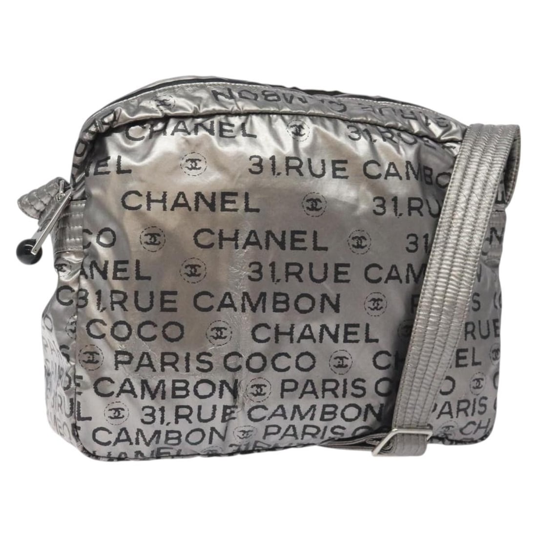 CHANEL Nylon Shoulder Bag in Silver Italy Made: CHANEL Nylon Shoulder Bag in Silver Italy Made CHANEL Unlimited shoulder bag in silver nylon with an adjustable shoulder strap. Made in Italy, this women's bag is offered without the original box or d