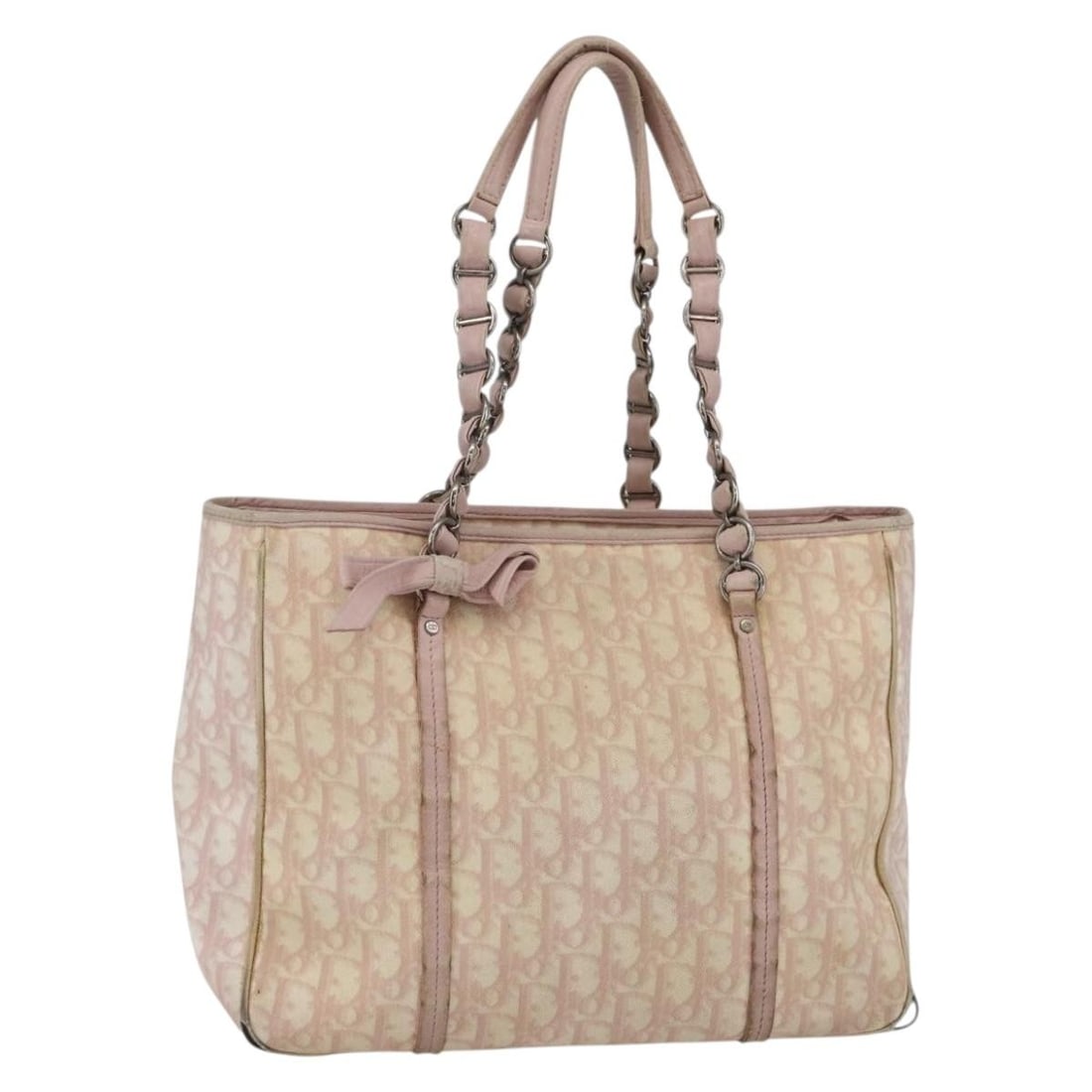 Christian Dior Pink Silver Trotter Canvas Tote Bag Authentic: Christian Dior Pink Silver Trotter Canvas Tote Bag Authentic Introducing the Christian Dior Trotter Canvas Romantic Chain Bag in a stunning Pink and Silver colorway. This stylish tote bag is crafted f