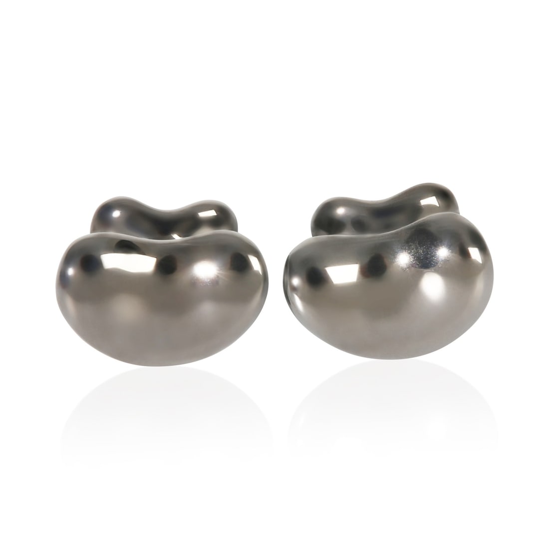 Paloma Picasso Bean Ruthenium Cufflinks by Tiffany & Co.: Paloma Picasso Bean Ruthenium Cufflinks by Tiffany & Co. These pre-owned cufflinks from the Tiffany & Co. Paloma Picasso Bean collection feature a sleek design crafted from ruthenium. Made in Italy, t