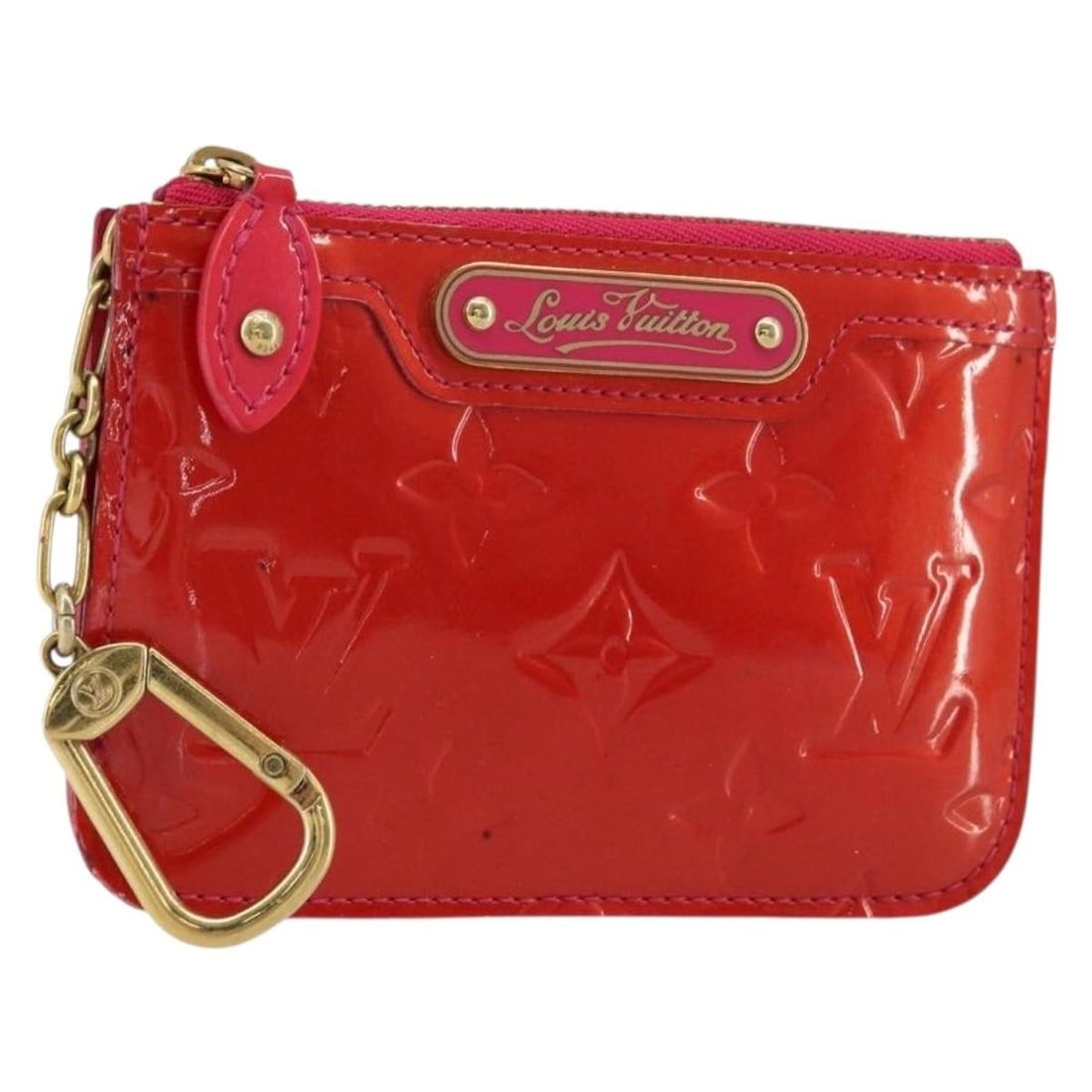Louis Vuitton Vernis Rose Pop Coin Purse M93637: Louis Vuitton Vernis Rose Pop Coin Purse M93637 This Louis Vuitton Vernis Pochette Cles NM coin purse is crafted from patent leather in the vibrant Rose Pop color. The compact design is ideal for carr