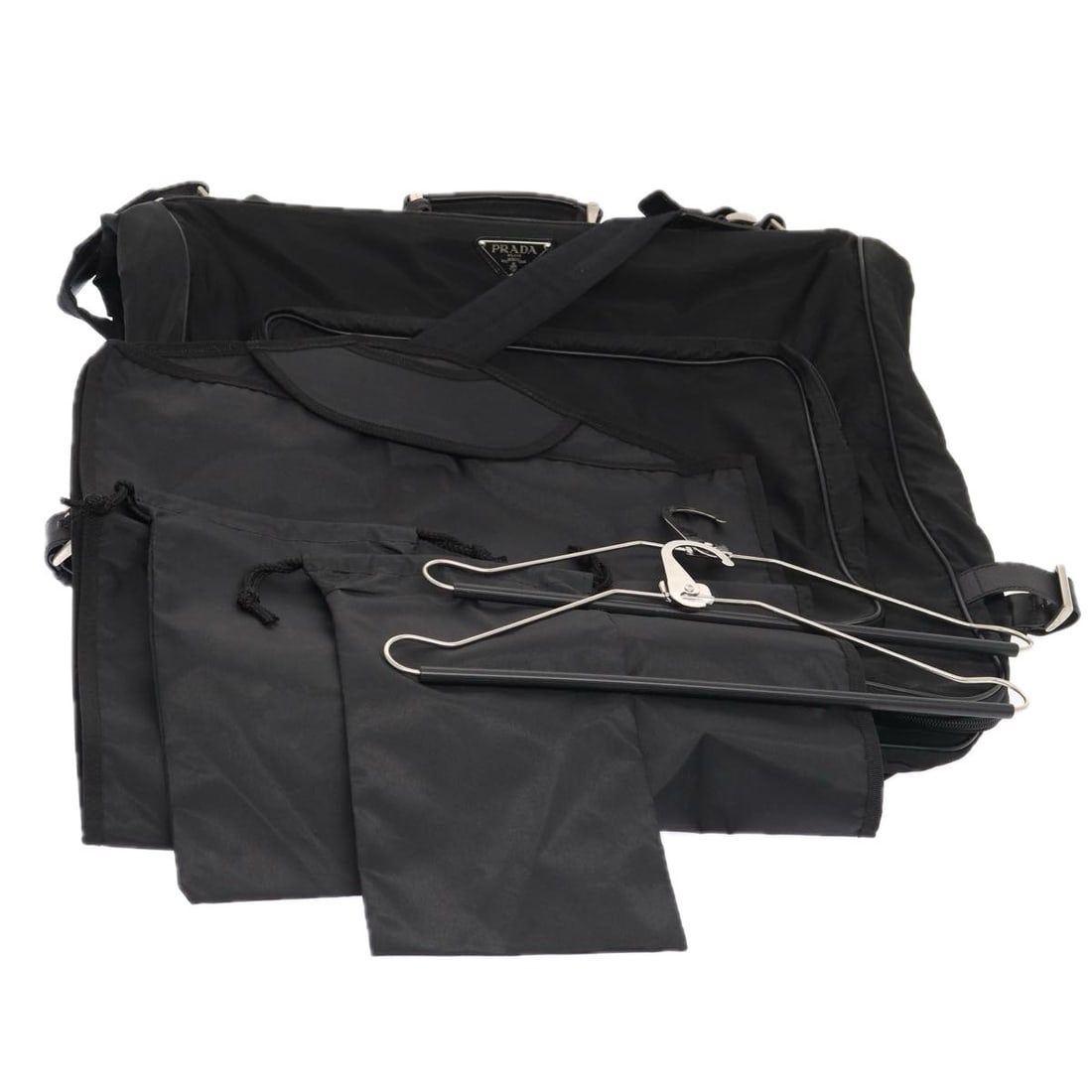Prada nylon black silver garment cover with accessories: Prada nylon black silver garment cover with accessories This PRADA garment cover is crafted from durable nylon in a black and silver color scheme. Designed for women, it features both a handle and a s
