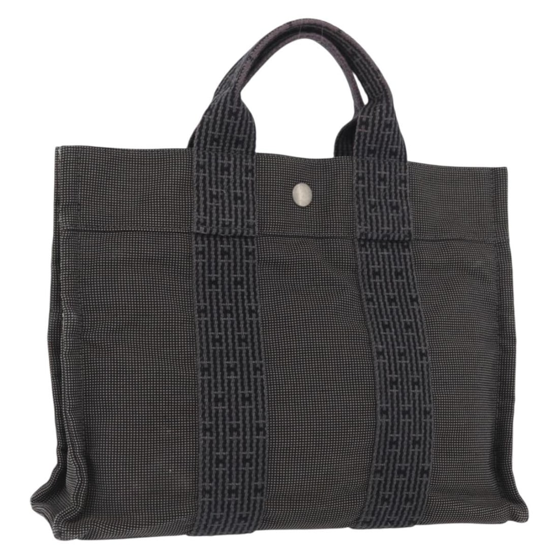 Hermes Her Line PM Gray Canvas Women's Handbag Made in France: Hermes Her Line PM Gray Canvas Women's Handbag Made in France This Hermes Her Line PM hand bag features a gray and silver canvas exterior and is designed for women. It is crafted in France and include