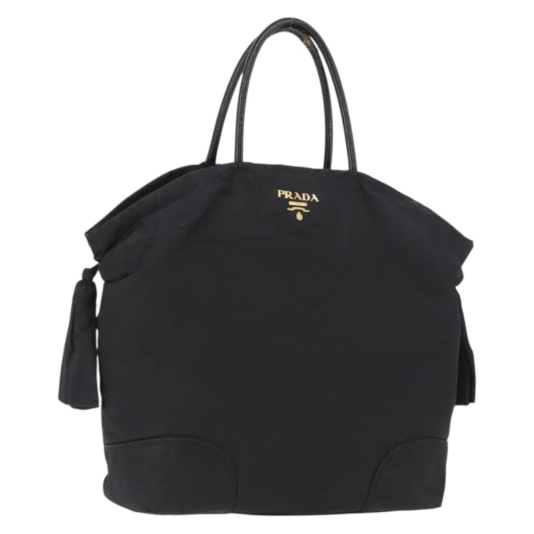 Prada black nylon women s handbag made in Italy: Prada black nylon women s handbag made in Italy This PRADA hand bag is crafted from black nylon with gold-tone accents and is designed for women. Made in Italy, it features approximate dimensions of 2