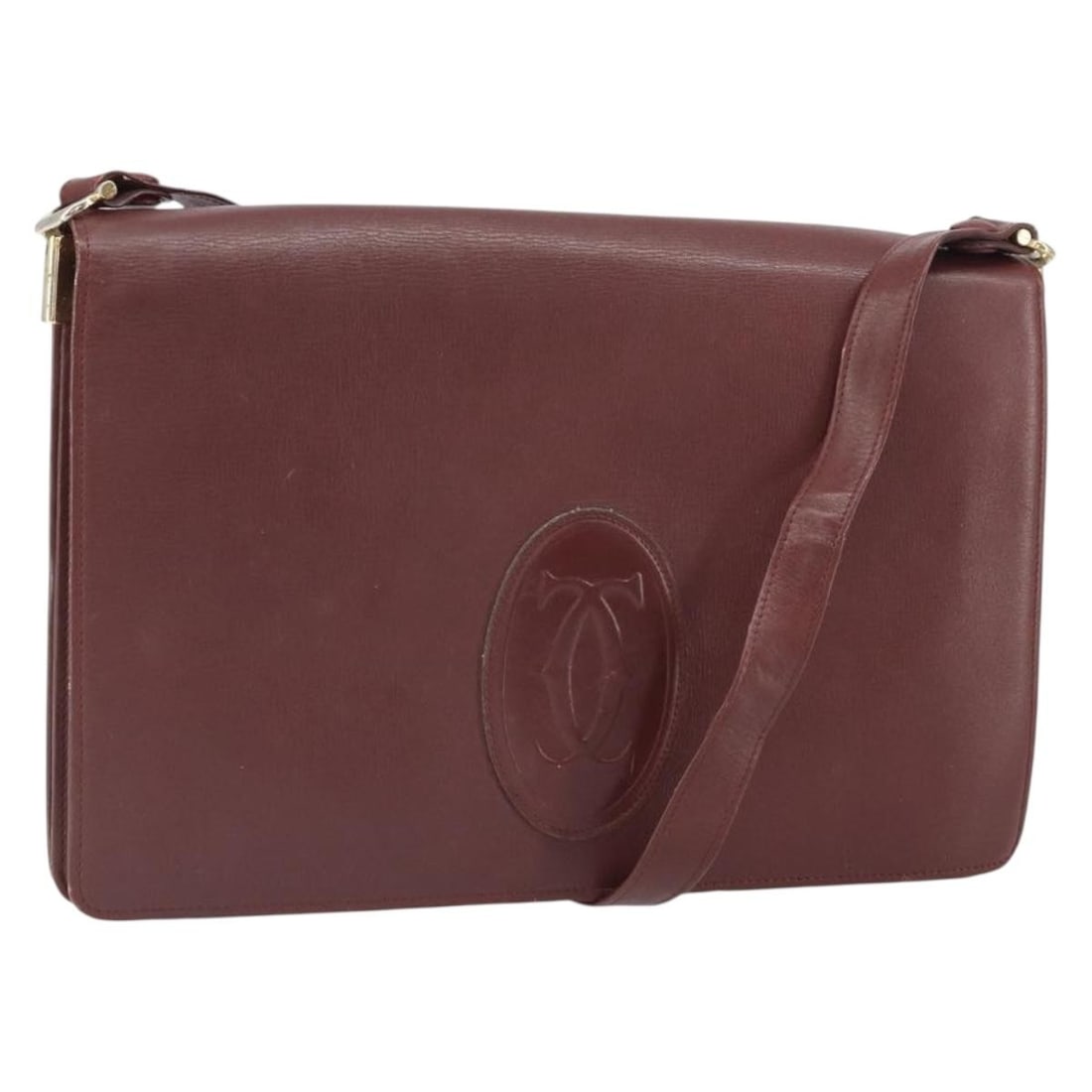 Cartier Must Line Bordeaux Leather Shoulder Bag with Gold Accents: Cartier Must Line Bordeaux Leather Shoulder Bag with Gold Accents This is a Cartier Must Line shoulder bag crafted from Bordeaux leather with gold-tone accents. The bag features a structured silhouett