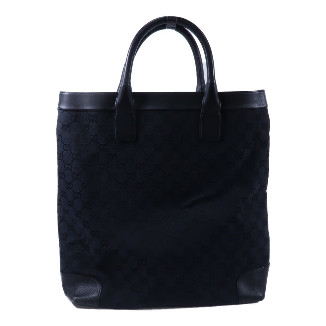 GUCCI 002.1121 GG Canvas Tote Black Italy: GUCCI 002.1121 GG Canvas Tote Black Italy This GUCCI tote bag is crafted from GG canvas in black and is designed for mens wear. It features a black frame color, a single inside zip pocket, and a handl