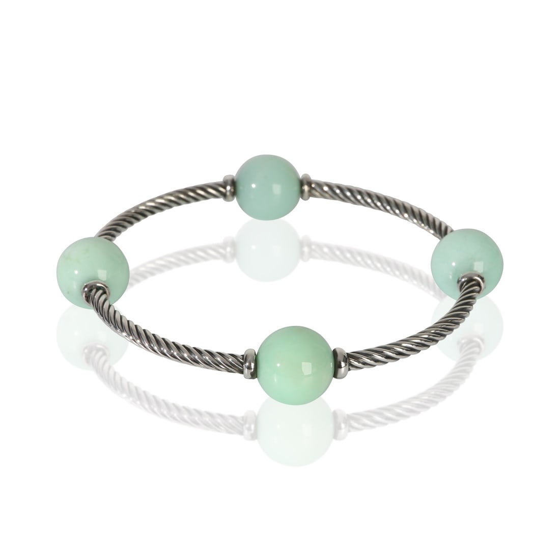 Mustique Collection Chrysoprase Sterling Silver Bracelet by David Yurman: Mustique Collection Chrysoprase Sterling Silver Bracelet by David Yurman This pre-owned David Yurman Mustique bracelet features a chrysoprase main stone set in sterling silver with 925 metal purity. D
