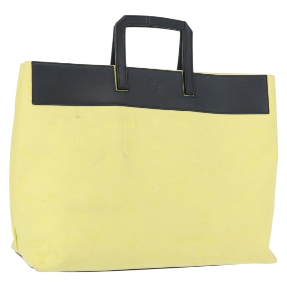 Loewe Canvas Tote in Yellow Gold Hue Made in Spain: Loewe Canvas Tote in Yellow Gold Hue Made in Spain This LOEWE tote bag features a stylish yellow and gold canvas exterior. Made in Spain, the bag offers ample space and functionality, with a structure