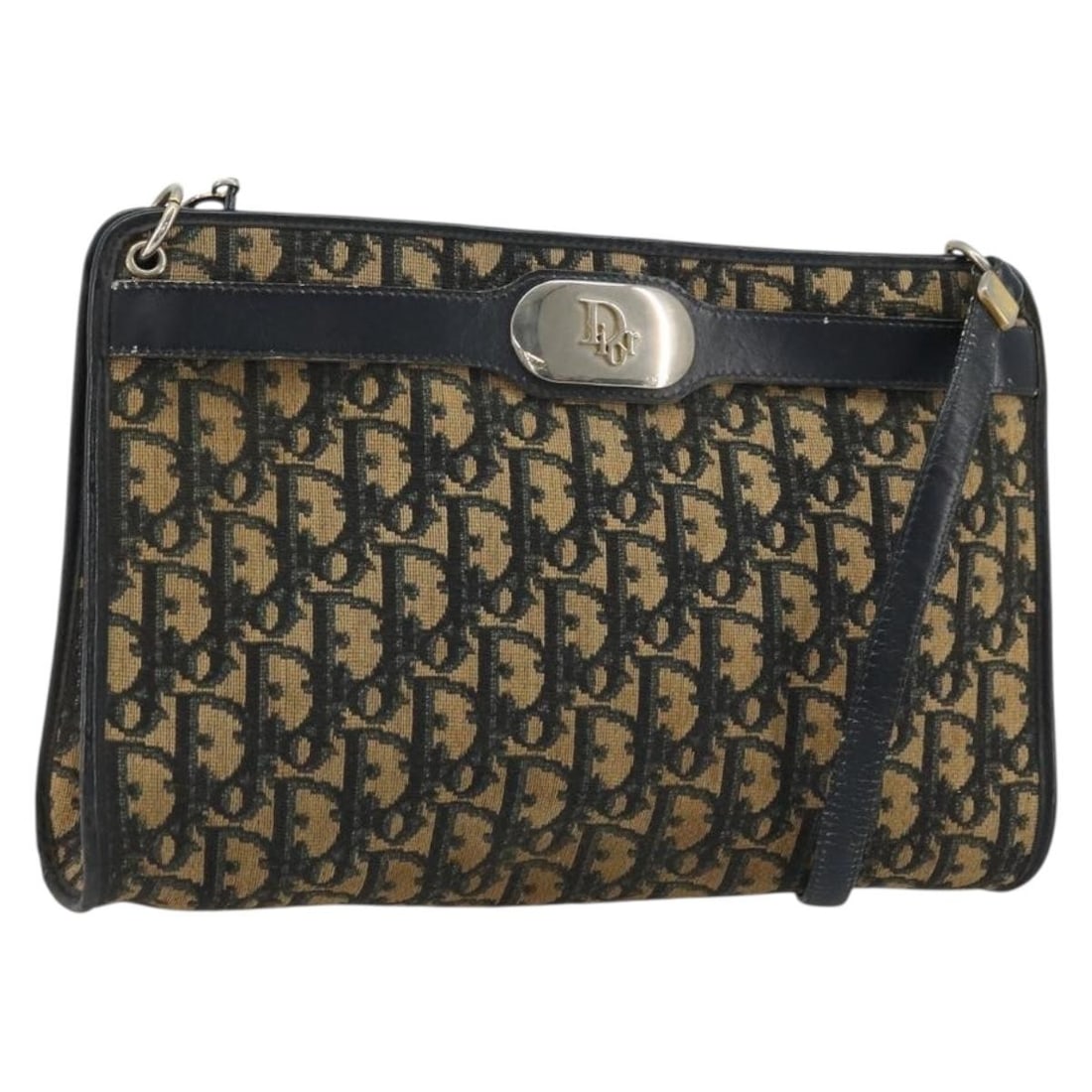 Christian Dior Navy Gold Trotter Canvas Shoulder Bag: Christian Dior Navy Gold Trotter Canvas Shoulder Bag Christian Dior Trotter Canvas Shoulder Bag in navy and gold, made in France. This women's shoulder bag is crafted from Trotter Canvas with an exter