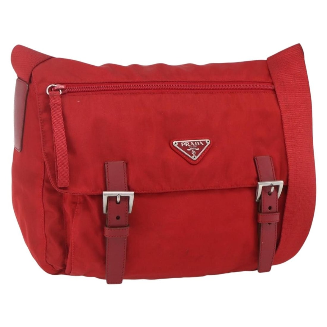 PRADA Red Nylon Shoulder Bag with Guarantee Card Italy: PRADA Red Nylon Shoulder Bag with Guarantee Card Italy A Prada shoulder bag in red nylon with silver-tone hardware. It comes with a guarantee card and was made in Italy. The bag shows heavy use, with 