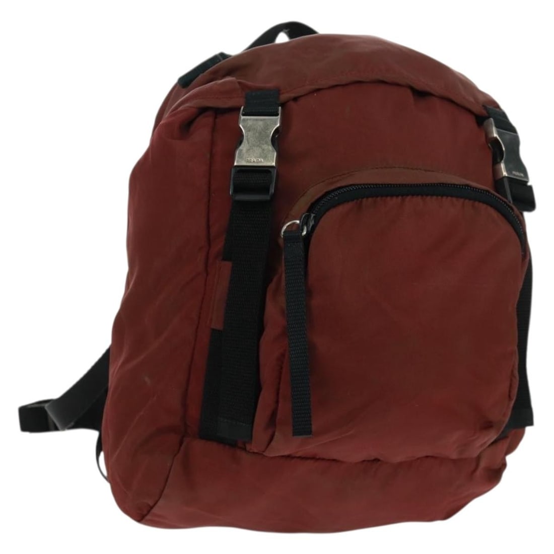 Red Nylon Prada Backpack with Silver Accents from Italy: Red Nylon Prada Backpack with Silver Accents from Italy This is a PRADA backpack crafted from durable nylon in a striking red and silver color combination. Made in Italy, the bag features a spacious m