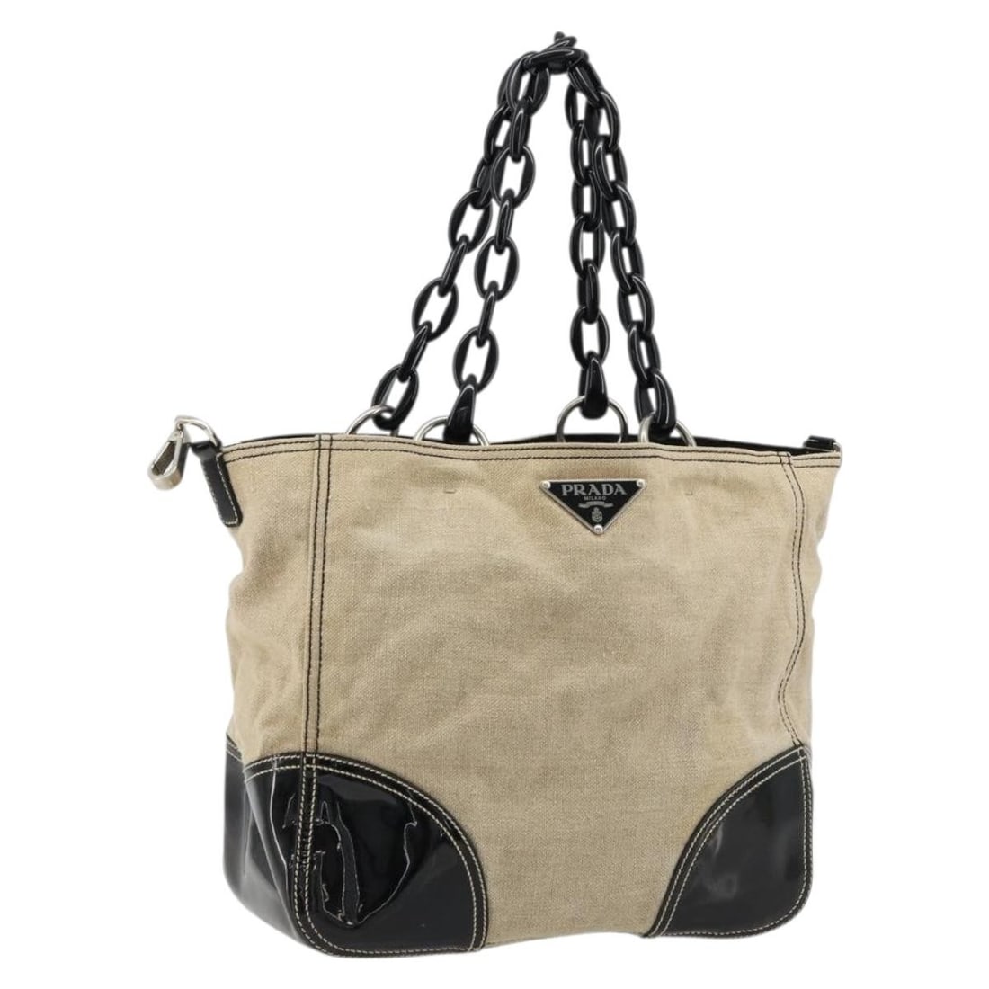 Prada Canvas Tote Bag Beige Silver Plastic Chain Italy: Prada Canvas Tote Bag Beige Silver Plastic Chain Italy A Prada tote bag in beige and silver, crafted from canvas and made in Italy. It features a plastic chain handle with an approximate 22 cm handle 