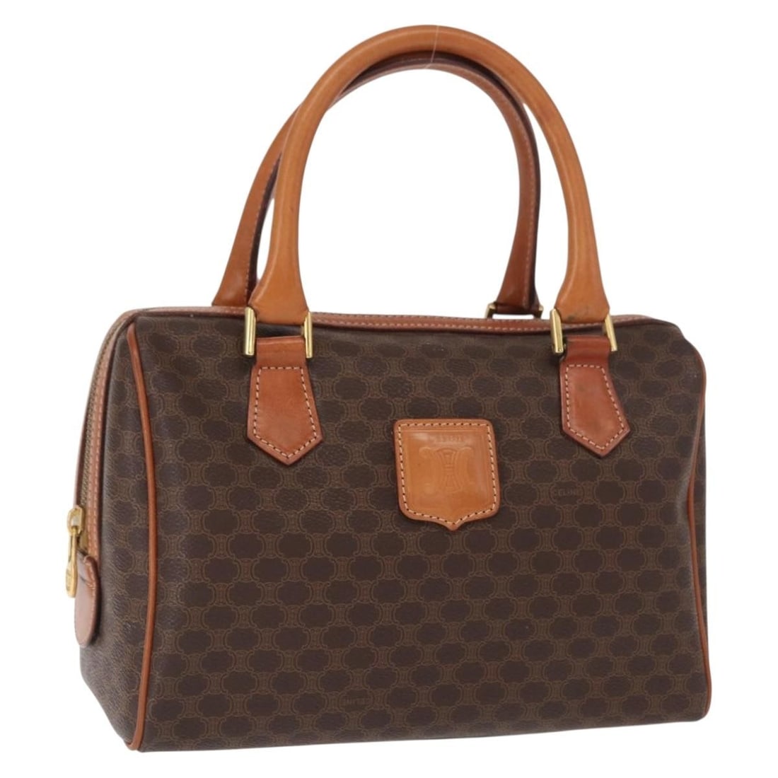 Celine Macadam Boston Bag Brown PVC Leather Gold Tone Hardware: Celine Macadam Boston Bag Brown PVC Leather Gold Tone Hardware A CELINE Boston bag in brown and gold, made from PVC leather and Macadam canvas. It is made in Italy and comes with only the item shown i