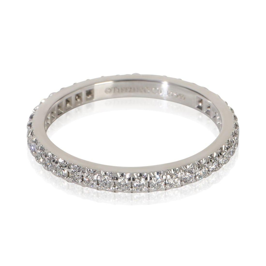 Tiffany & Co. Soleste platinum diamond band ring size 5: Tiffany & Co. Soleste platinum diamond band ring size 5 This Tiffany & Co. Soleste band features a classic round brilliant diamond design set in 950 platinum. The band showcases a total diamond weight