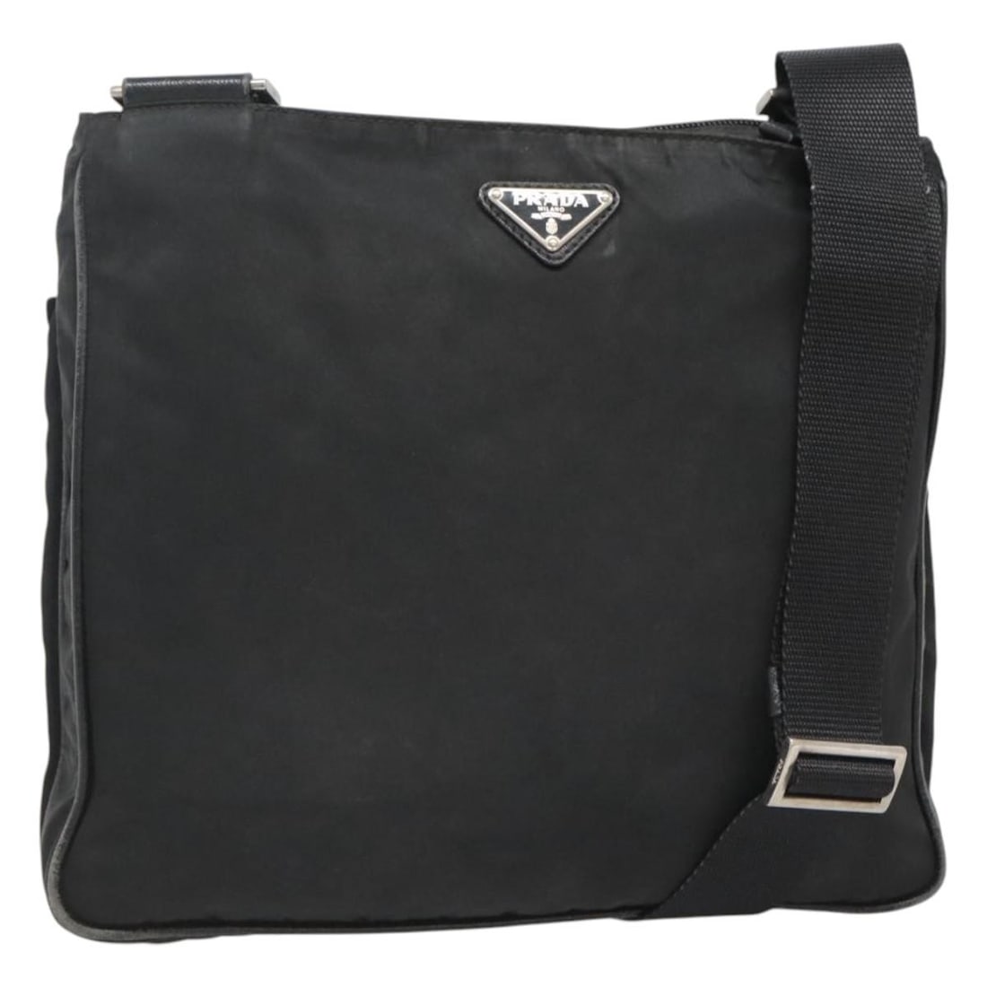 Prada Black Nylon Shoulder Bag Silver Trim Italy: Prada Black Nylon Shoulder Bag Silver Trim Italy This PRADA shoulder bag is crafted from durable nylon in a black and silver color scheme. Designed for women, the bag is made in Italy and features an 