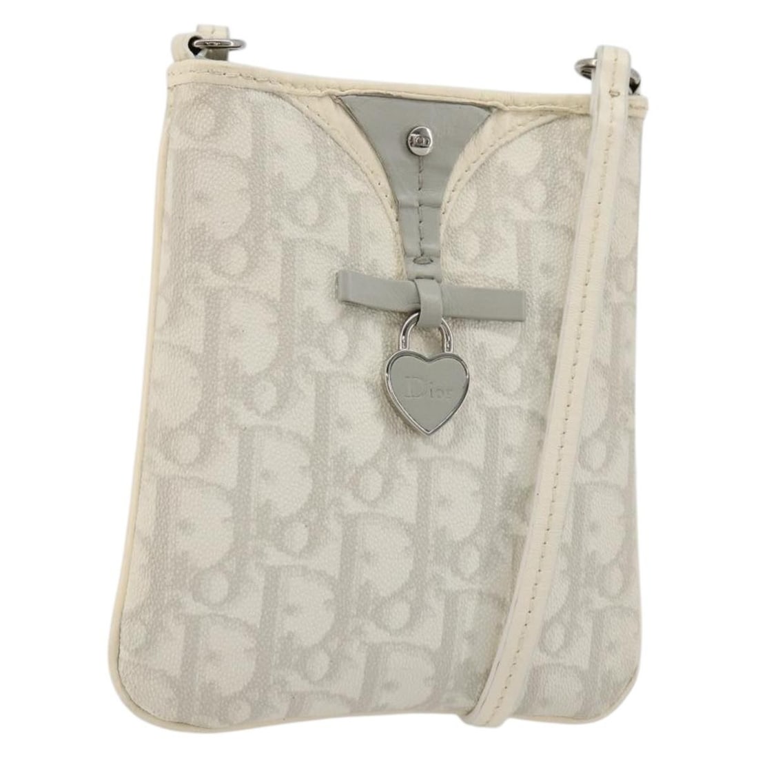 Christian Dior Romantic Shoulder Bag in White Trotter Canvas PVC: Christian Dior Romantic Shoulder Bag in White Trotter Canvas PVC Christian Dior Trotter Canvas Romantic shoulder bag in white and silver, made in Italy. It is crafted from PVC leather and Trotter canv