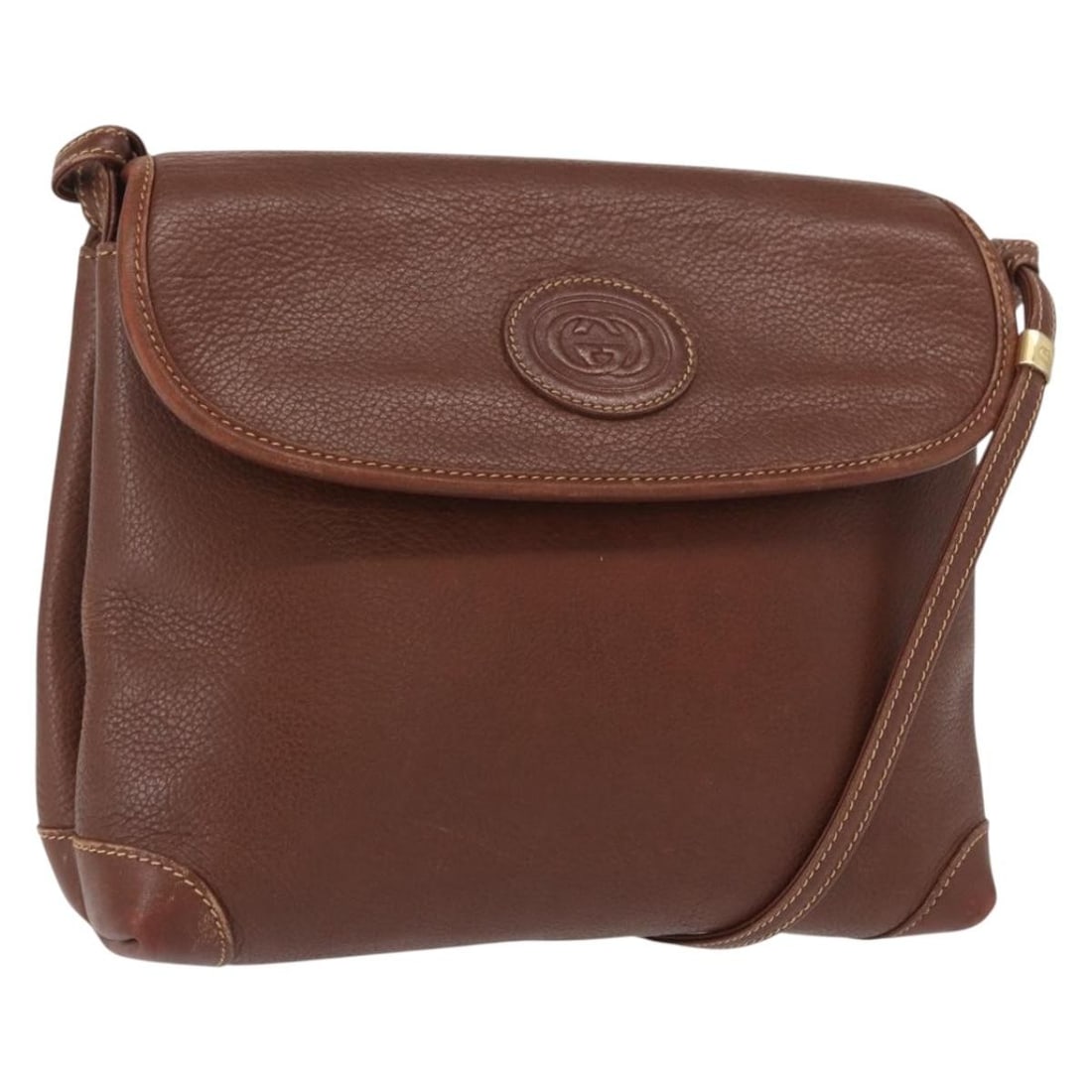 Brown Leather Gucci Shoulder Bag with Gold Accents Made in Italy: Brown Leather Gucci Shoulder Bag with Gold Accents Made in Italy This GUCCI shoulder bag is crafted from brown leather with gold-tone accents. The bag features a compact design with approximate dimens