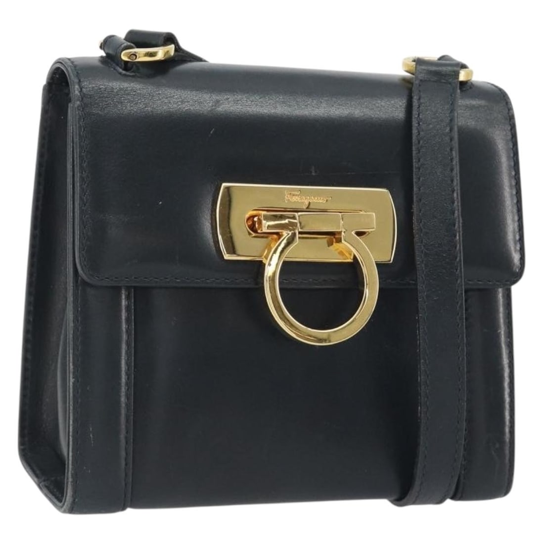 Salvatore Ferragamo Gancini Leather Shoulder Bag Navy Gold Tone: Salvatore Ferragamo Gancini Leather Shoulder Bag Navy Gold Tone Salvatore Ferragamo Gancini shoulder bag in navy and gold leather, made in Italy. The bag features a shoulder strap with an approximate 