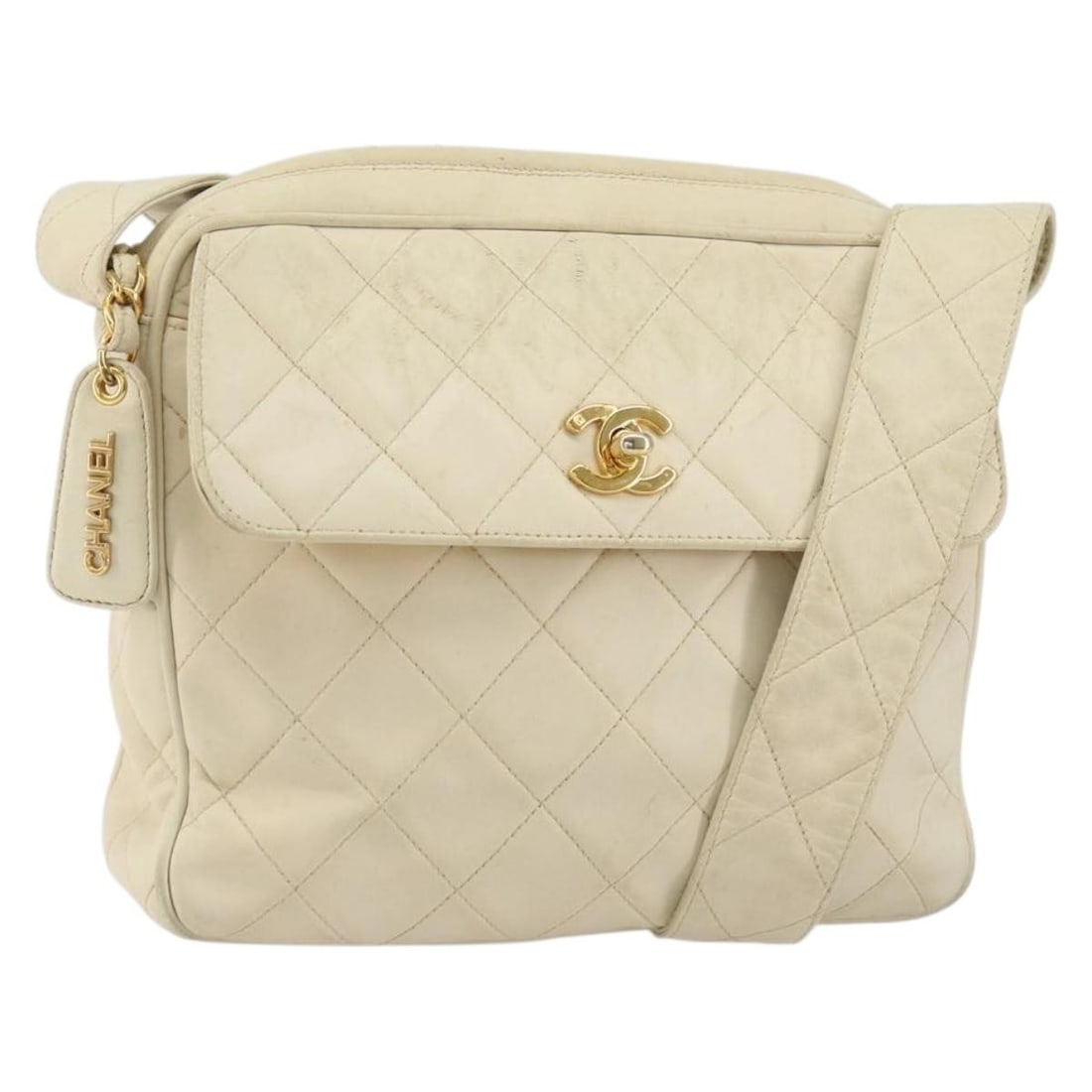 White Lambskin CHANEL Matelasse CC Shoulder Bag: White Lambskin CHANEL Matelasse CC Shoulder Bag CHANEL Matelasse shoulder bag in white and gold lamb skin, made in Italy. This women's bag features a shoulder strap with an approximate 20.5 inch (52 c
