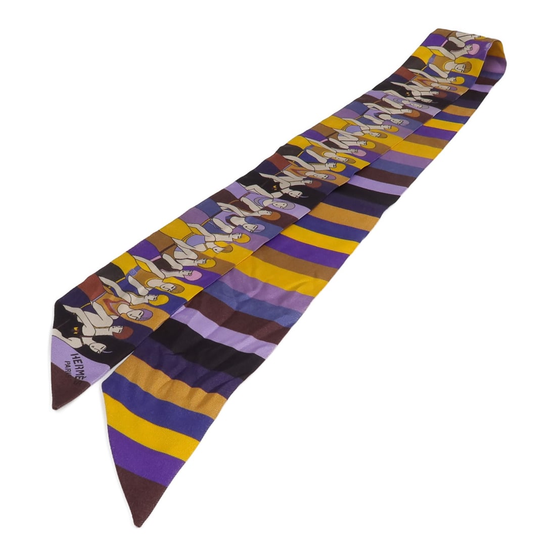 Hermes Twilly Silk Scarf Purple Yellow Brown Black 062748S: Hermes Twilly Silk Scarf Purple Yellow Brown Black 062748S Hermes Twilly scarf in silk with a purple, yellow, brown, and black colorway. Made in France, it comes with a storage box and is listed in he