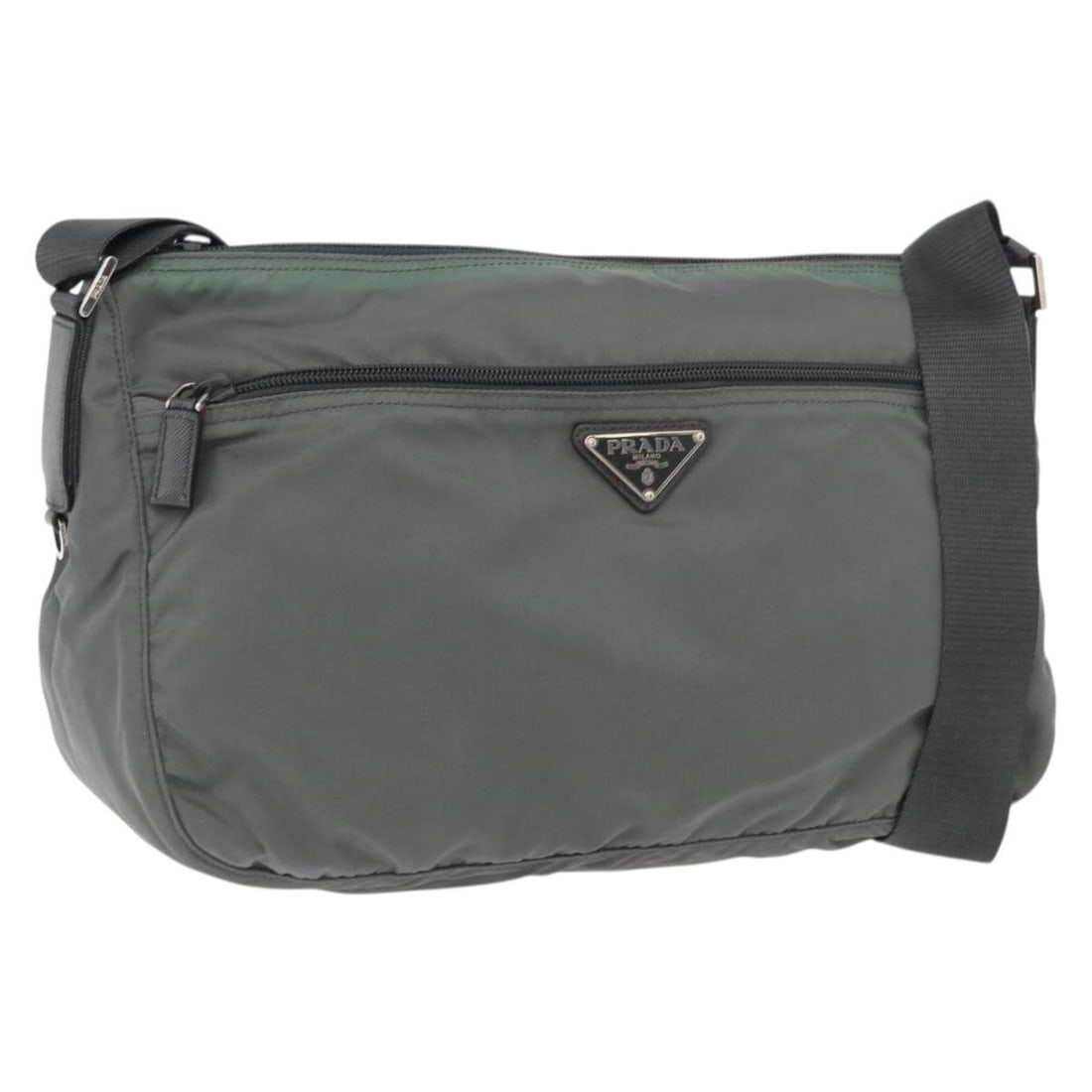 PRADA Nylon Shoulder Bag in Green with Silver Tone Hardware: PRADA Nylon Shoulder Bag in Green with Silver Tone Hardware Authentic Prada shoulder bag in green nylon with silver-tone accents. Made in Italy, this women's bag includes the guarantee card. Condition