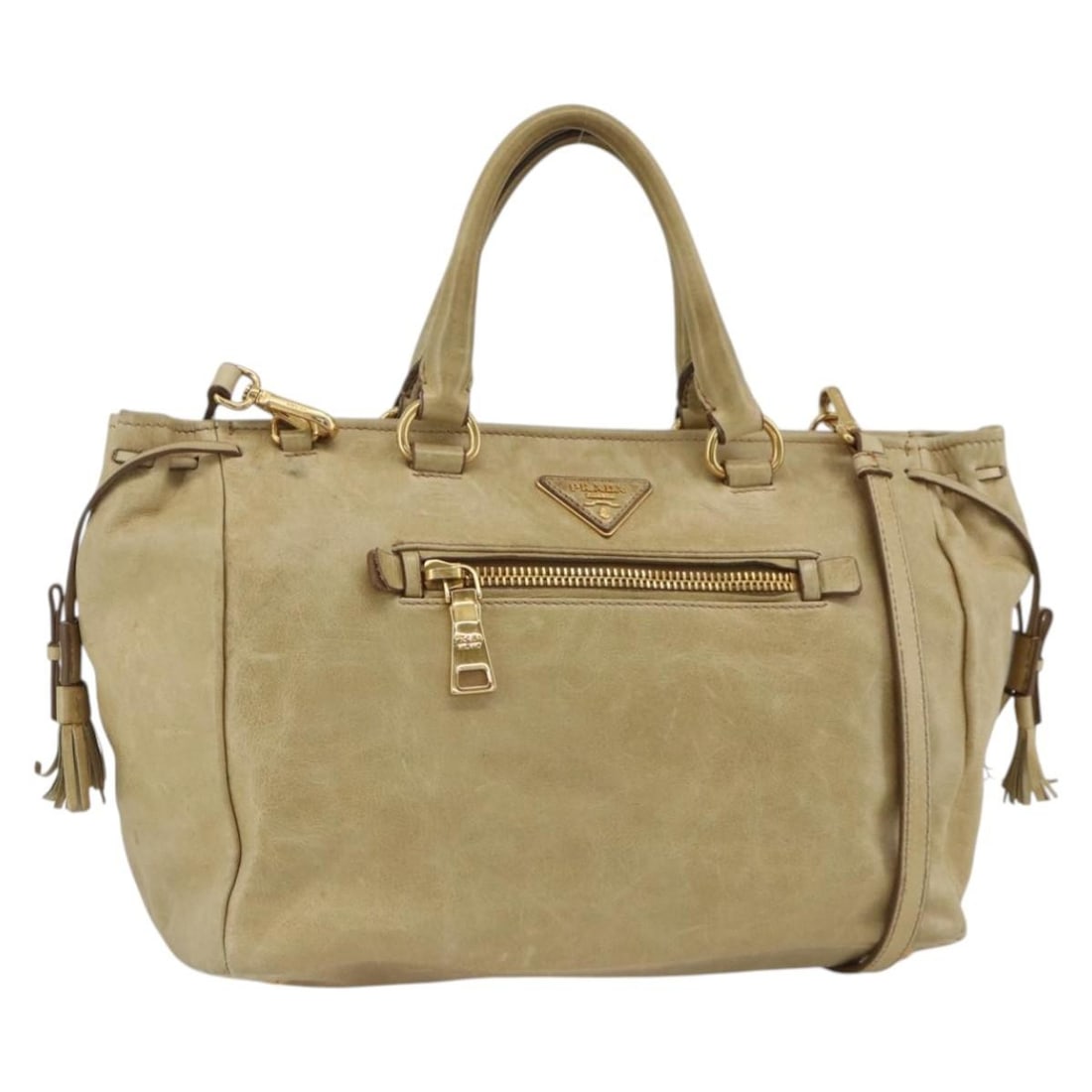Prada Beige Leather Two Way Shoulder and Handbag Gold Accents Italy: Prada Beige Leather Two Way Shoulder and Handbag Gold Accents Italy This PRADA 2-way handbag is crafted from beige and gold leather and is designed for women. It features both top handles and a detach