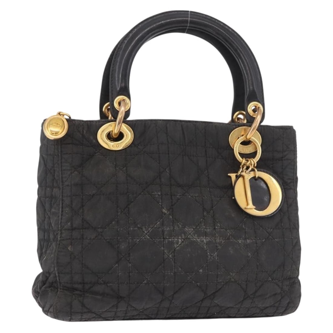Christian Dior Cannage Canvas Hand Bag Black Gold Tone: Christian Dior Cannage Canvas Hand Bag Black Gold Tone Christian Dior Canage hand bag in black and gold canvas, made in Italy. The bag measures approximately 23 cm wide, 20 cm high, and 9 cm deep, wit