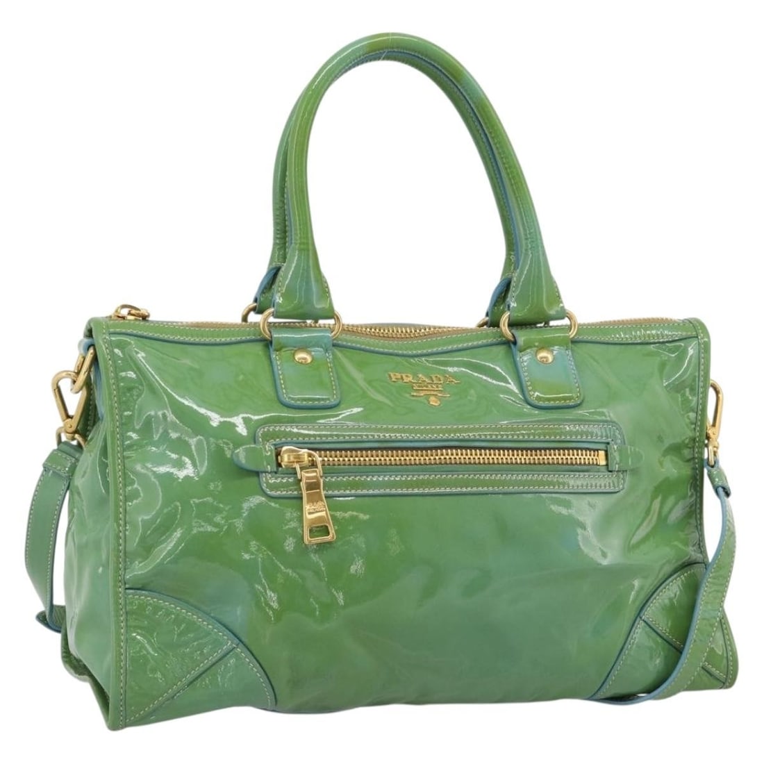 PRADA Green Patent Leather 2way Handbag with Shoulder Strap: PRADA Green Patent Leather 2way Handbag with Shoulder Strap PRADA hand bag in patent leather with a green and gold exterior, made in Italy. It comes with a shoulder strap and features a 2-way style. T