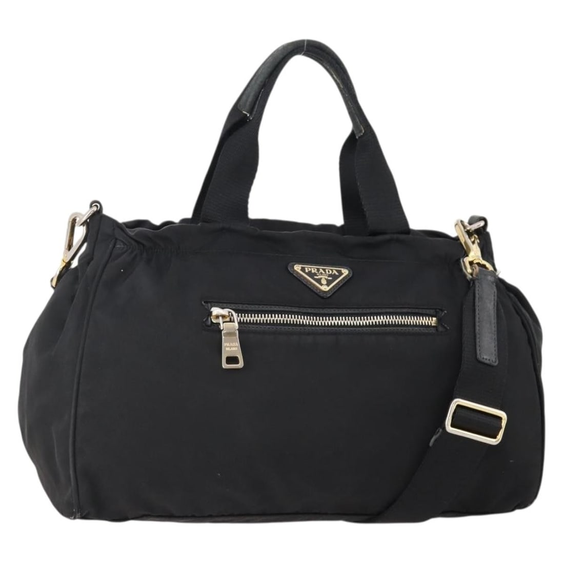 Prada Black Nylon Convertible Shoulder and Handbag with Gold Hardware: Prada Black Nylon Convertible Shoulder and Handbag with Gold Hardware This PRADA handbag is crafted from black nylon with gold-tone accents and offers versatile 2-way carrying options. Designed for wo