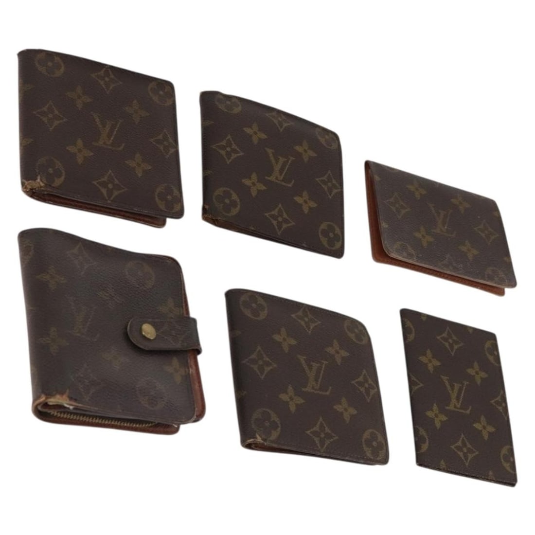 Set of 6 Louis Vuitton Monogram Canvas Wallets: Set of 6 Louis Vuitton Monogram Canvas Wallets Louis Vuitton Monogram wallet set in Monogram Canvas. This special bundle offer is described as heavily used, with visible wear including deformation, ru