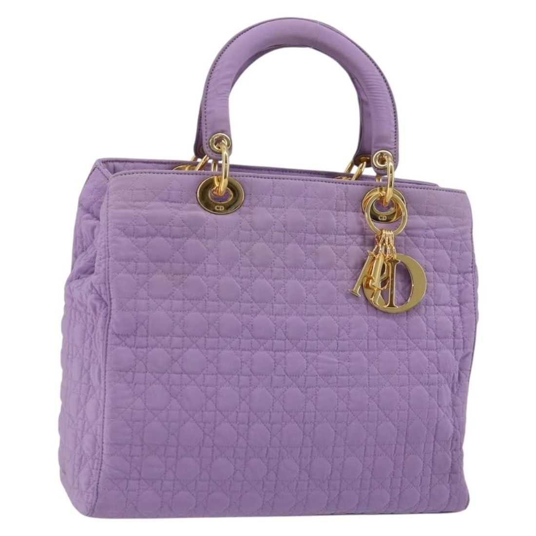Christian Dior Lady Dior Cannage Nylon Handbag Lavende Gold Charm: Christian Dior Lady Dior Cannage Nylon Handbag Lavende Gold Charm Christian Dior Lady Dior handbag in nylon with a Canage design, presented in lavender and gold. It includes a charm accessory and was 