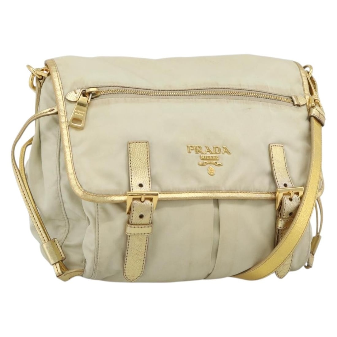 PRADA Gold Nylon Shoulder Bag Made in Italy: PRADA Gold Nylon Shoulder Bag Made in Italy PRADA shoulder bag in nylon, made in Italy, presented in gold color. It measures approximately 25 cm W x 24 cm H x 11 cm D, with a shoulder drop of about 48