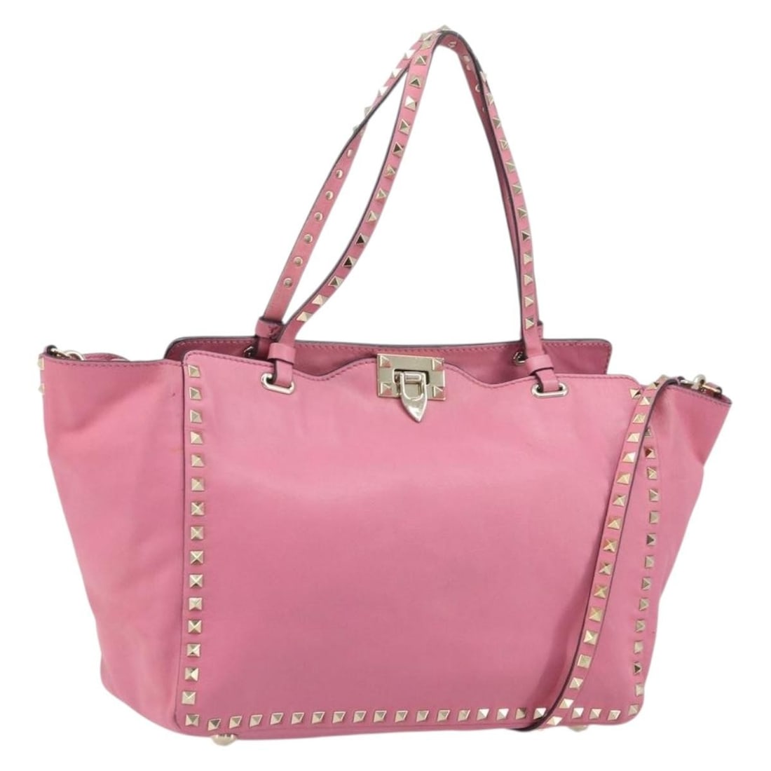 Valentino Pink Leather 2way Tote Bag with Shoulder Strap Studded: Valentino Pink Leather 2way Tote Bag with Shoulder Strap Studded This Valentino studded tote bag is crafted from leather in pink with gold-tone accents. It is a 2-way style and comes with a shoulder s