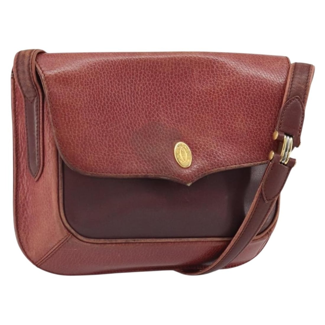 Cartier Must Line Bordeaux Leather Shoulder Bag with Gold Tone Accents: Cartier Must Line Bordeaux Leather Shoulder Bag with Gold Tone Accents This Cartier Must Line shoulder bag features bordeaux leather with gold-tone accents. The bag is made in Spain and includes a mat