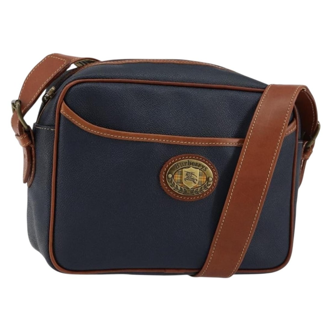 Burberrys Navy Gold PVC Leather Shoulder Bag Authentic England: Burberrys Navy Gold PVC Leather Shoulder Bag Authentic England This Burberrys shoulder bag embodies a blend of stylish design and practicality. Crafted from PVC leather, it features a striking navy an