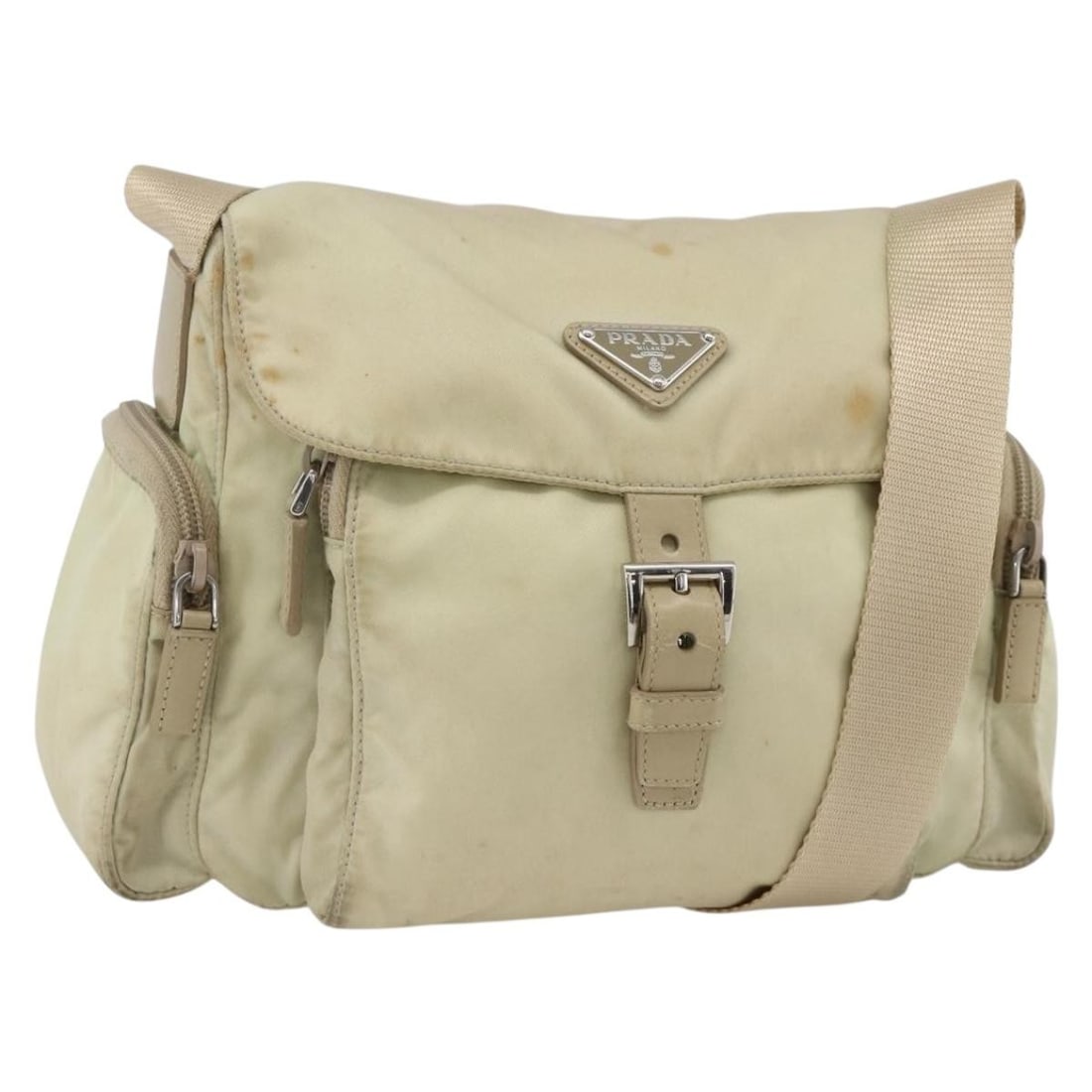 Prada Ivory Nylon Shoulder Bag Silver Tone Hardware Made in Italy: Prada Ivory Nylon Shoulder Bag Silver Tone Hardware Made in Italy Prada shoulder bag in ivory and silver, made from nylon and crafted in Italy. It features a shoulder strap with an approximate drop of