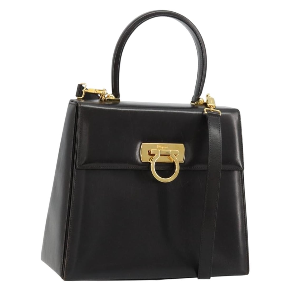 Leather 2way handbag with strap Salvatore Ferragamo Gancini black gold: Leather 2way handbag with strap Salvatore Ferragamo Gancini black gold Salvatore Ferragamo Gancini 2-way handbag in black leather with gold-tone accents. Made in Italy, this women's bag includes a sho
