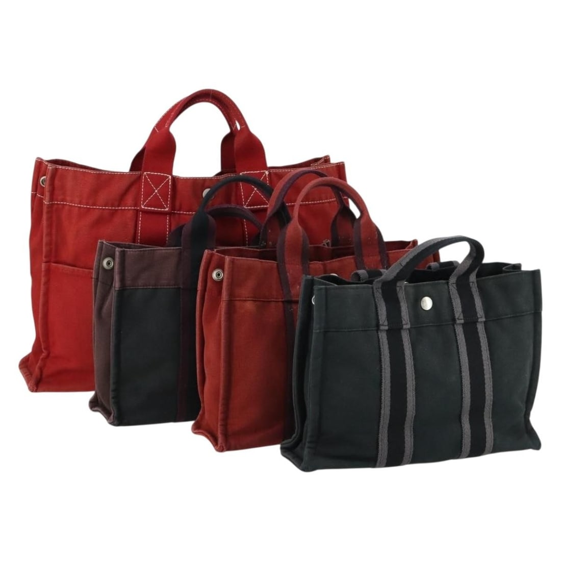 Hermes Fourre Tout Canvas Handbag Set of 4 Black Red Bordeaux: Hermes Fourre Tout Canvas Handbag Set of 4 Black Red Bordeaux This Hermes Fourre Tout handbag set features four pieces crafted from durable cotton in a combination of black, red, and bordeaux colors. 